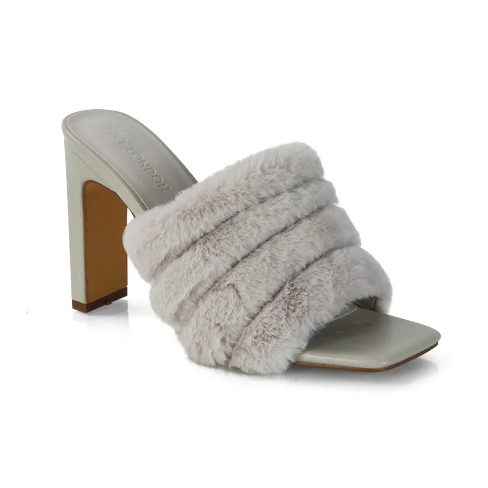 Hunter Fluffy Faux Fur Front Strap Square Toe High Slim Block Heel Mules in Nude
