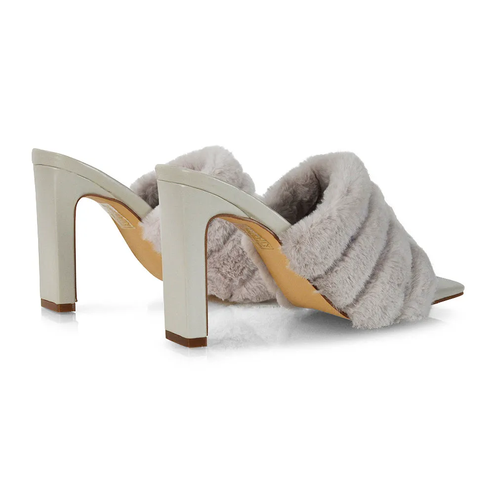 Hunter Fluffy Faux Fur Front Strap Square Toe High Slim Block Heel Mules in Nude